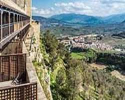 It is a restored castle on a hill overlooking the It is a restored castle on a hill overlooking the ancient city of Jaen, its structure has high, arched ceilings, wooden beams and tiled floors feature